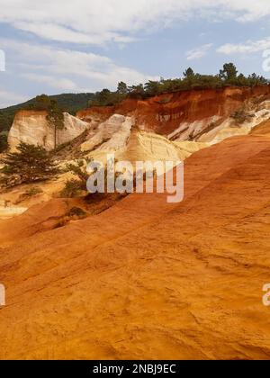 rocks hill of natural ochre in rustrel Roussillon in Luberon Provence France Stock Photo