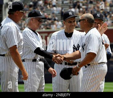 Former professional baseball right fielder, Reggie Jackson holds a