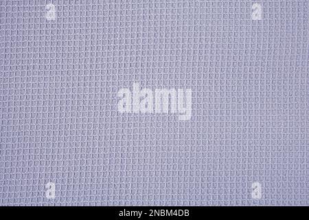 background of soft blue cotton fabric in a small cell Stock Photo