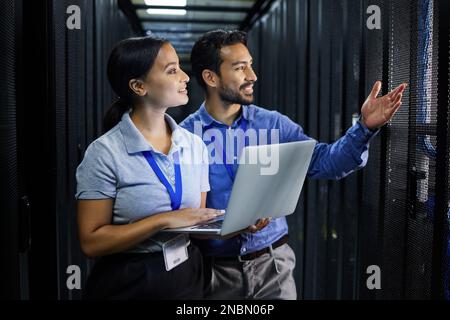 Server room, laptop and manager people or technician in data center management, system and cyber security. Teamwork, inception and engineering or Stock Photo