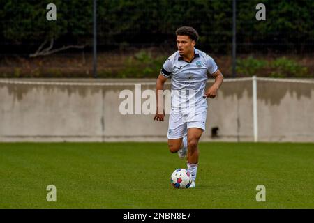 Swansea, Wales. 4 February 2023. Zane Myers of Swansea City under pressure  from Oliver Evans of Millwall during the Professional Development League  game between Swansea City Under 18 and Millwall Under 18