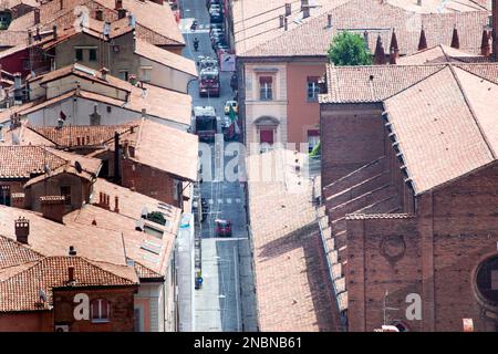 Aerial view of Bologna, city in Italy,  known for its Spanish-style red tiled rooftops, medieval defensive towers and home to the oldest university. Stock Photo