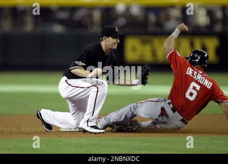 Washington Nationals' Ian Desmond, right, tags out New York Mets' Mike  Nickeas during the sixth inning of a baseball game on Saturday, April 9,  2011, at CitiField in New York. (AP Photo/Frank