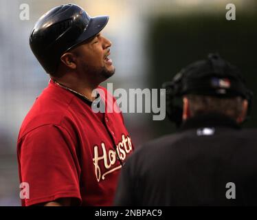 JUNE 27 2012: Houston Astros first baseman Carlos Lee #45 hits a pitch  during the MLB baseball game between the Houston Astros and the San Diego  Padres from Minute Maid Park in