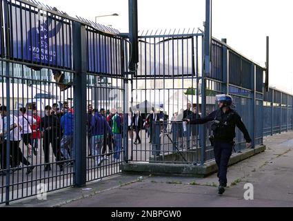 File photo dated 28-05-2022 of Police use pepper spray against fans outside the ground as the kick off is delayed during the UEFA Champions League Final at the Stade de France, Paris. Liverpool have implored UEFA to fully implement all the recommendations made in the highly-critical independent report into the last year’s Champions League final chaos. Issue date: Tuesday February 14, 2023. Stock Photo