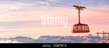 Chamonix Mont Blanc, France cable car cabin at Aiguille du Midi and pink sunset sky, French Alps Stock Photo