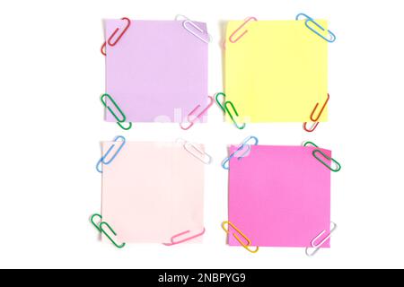 Multi colored paper stickers for writing notes white background Stock Photo