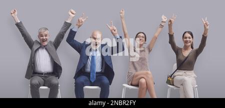 Happy business people celebrating together after the job interview, they got the job Stock Photo