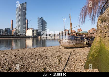 Chelsea Waterfront Across the Thames at Low Tide, shot from Old Swan Wharf, Battersea. Stock Photo