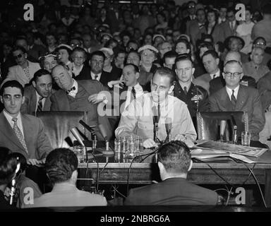 https://l450v.alamy.com/450v/2nbrg6a/there-are-five-glasses-of-water-in-front-of-pvt-g-david-schine-as-he-testifies-before-the-senate-investigations-subcommittee-in-washington-on-april-29-1954-immediately-behind-him-are-left-to-right-joseph-welch-chief-counsel-for-the-army-in-this-inquiry-army-counsel-john-adams-col-kenneth-belieu-and-secretary-of-the-army-robert-stevens-who-was-dismissed-from-the-witness-stand-temporarily-so-that-schine-could-be-heard-ap-photo-2nbrg6a.jpg