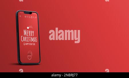 Christmas wishes on smartphone screen and red background with copy space Stock Photo