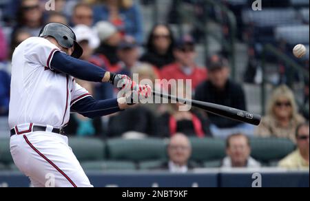 Braves catcher Brian McCann enjoys family time with his 1-year old son,  Colt, before Atlanta's game against the Miami Marlins at Turner Field in  Atlanta, Georgia, Sunday, August 11, 2013. (Photo by