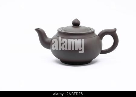 traditional Chinese teapot made of Issinclay clay, tea ceremonion, isolated on a white background, design Stock Photo