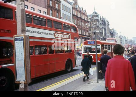 London 1972. A street view of Oxford street with the traffic passing, buses and taxis. Kristoffersson ref DV7 Stock Photo