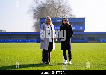 Karen Carney MBE, with Chelsea Women's manager Emma Hayes (left) following a DCMS media event at Kingsmeadow, London. In September, the Government announced the launch of a review of domestic women’s football, chaired by former England and Great Britain footballer Karen Carney MBE, the in-depth review will look at how to deliver bold and sustainable growth of the game at elite and grassroots level. Picture date: Tuesday February 14, 2023. Stock Photo