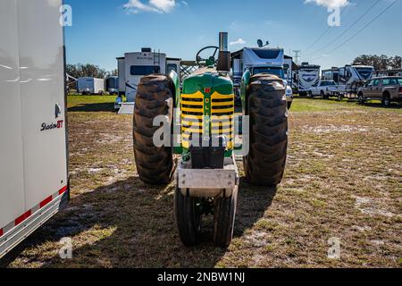 Fort Meade, FL - February 24, 2022: High perspective front view of a 1958 Oliver Super 77 Tractor at a local tractor show. Stock Photo