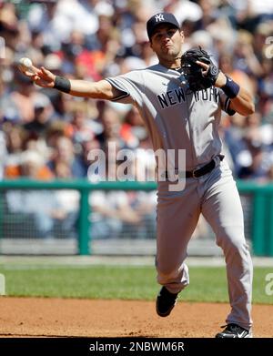New York Yankees third baseman Eric Chavez (12) throws to first during the  third inning of a baseball game against the Detroit Tigers, Thursday, May  5, 2011, in Detroit. (AP Photo/Carlos Osorio Stock Photo - Alamy