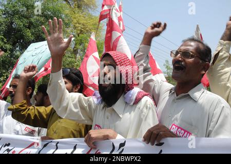 Supporters of the youth wing of the Pakistani religious party  Jamat-e-Islami rally to support Faisal Shahzad, the suspect accused of the  failed Times Square car bombing, in Karachi, Pakistan on Thursday, May