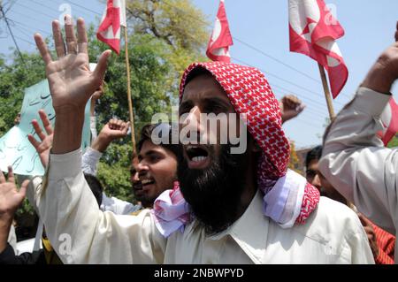 Supporters of the youth wing of the Pakistani religious party  Jamat-e-Islami rally to support Faisal Shahzad, the suspect accused of the  failed Times Square car bombing, in Karachi, Pakistan on Thursday, May