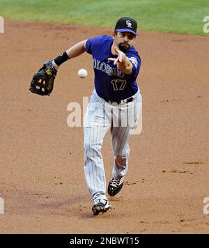 Colorado Rockies Todd Helton dives after a grounder hit by Arizona News  Photo - Getty Images