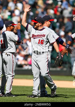 Minnesota Twins' Jason Kubel (16) celebrates his grand slam off