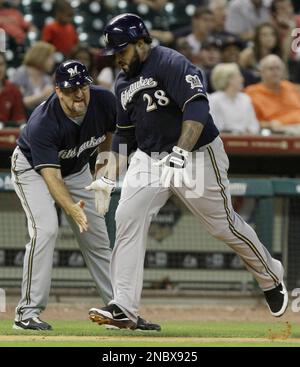 Milwaukee Brewers' Ryan Braun congratulates Kevin Mench who hit a two-run  home run in the fourth inning on Wednesday, July 18, 2007, at Miller Park  in Milwaukee, Wisconsin. (Photo by Rick Wood/Milwaukee