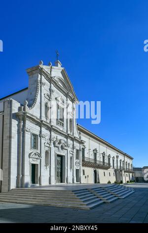 The facade of the cathedral and the bishop's palace in Melfi, a square of the historic town in southern Italy. Stock Photo