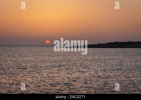 Sunset in Coral Bay resort in Pegeia city, Cyprus island country Stock Photo