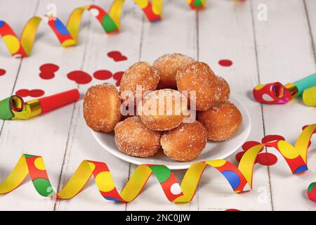 Traditional German 'Berliner Pfannkuchen', a donut without hole filled with jam served during carnival Stock Photo