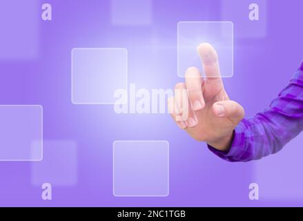 A female hand presses a holographic button Stock Photo