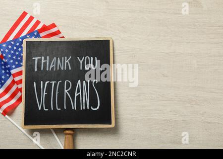 top view of american flags and thank you for your service lettering on ...