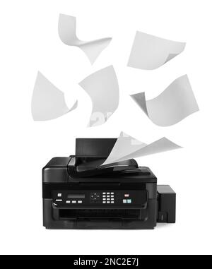 Modern multifunction printer and flying sheets of paper on white background Stock Photo