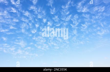 Panoramic view of beautiful spring blue sky with many white clouds. Abstract background with space for text Stock Photo