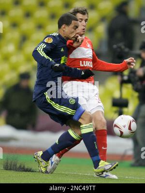 Gregory van der Wiel, left, and Marquinhos of Paris Saint-Germain football  club prepare to cut the ribbon during the opening ceremony for the Pop up S  Stock Photo - Alamy