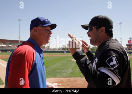 Chicago White Sox manager Ozzie Guillen, right, demonstrates a