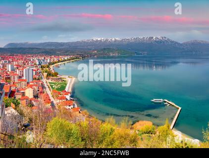 Sunrise in Pogradec town. Colorful summer view of Ohrid lake. Colorful morning scene of Albania, Europe. Traveling concept background. Stock Photo
