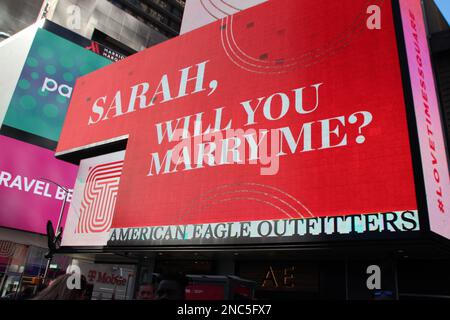 New York, USA. 14th Feb, 2023. A screen at a Valentine's Day engagement in New York's Times Square Credit: Christina Horsten/dpa/Alamy Live News Stock Photo