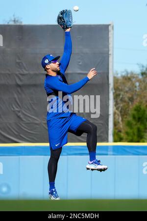 Toronto Blue Jays manager John Schneider, right, laughs as he arrives with  his team during baseball spring training in Dunedin, Fla., on Monday, Feb.  13, 2023. (Nathan Denette/The Canadian Press via AP