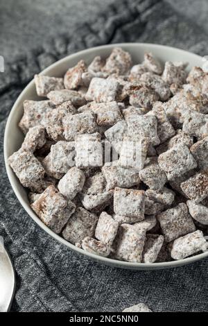 Homemade Sweet Muddy Buddy Puppy Chow with Peanut Butter and Chocolate Stock Photo