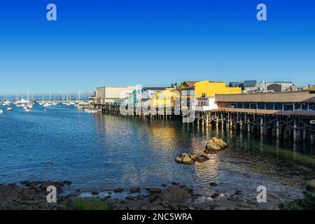 Monterey, CA, USA – December 17, 2022: View from the shore of Fisherman’s Wharf in Monterey, California. Stock Photo