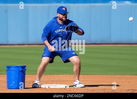 February 14, 2023, DUNEDIN, FL, UNITED STATES: Toronto Blue Jays manager  John Schneider catches a ball at second base during spring training in  Dunedin, Fla., on Tuesday, February 14, 2023. (Credit Image: ©