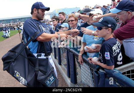 Hall of Fame outfielder Dave Winfield, left, presents New York Yankees  shortstop Derek Jeter with a gift from the old Yankee Stadium as Jeter was  honored for breaking Lou Gehrig's Yankee record