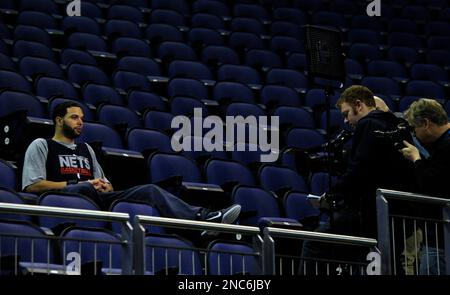 Utah Jazz player Earl Watson defends New Jersey Nets player Deron Williams  during the first half at Energy Solutions Arena in Salt Lake City, Utah on  January 14, 2012. (AP Photo/The Salt