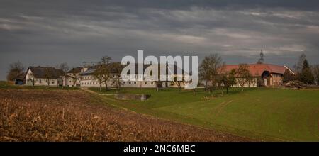 Farms and fields near Bad Hall town in cold winter without snow Stock Photo