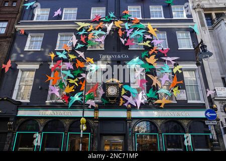 Christmas decorations on Tiffany & Co jewellery store on Old Bond Street in Mayfair London England United Kingdom UK Stock Photo