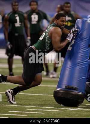 California defensive end Cameron Jordan runs a drill at the NFL football  scouting combine in Indianapolis, Monday, Feb. 28, 2011. (AP Photo/Michael  Conroy Stock Photo - Alamy