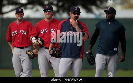 Boston Red Sox infielders Adrian Beltre, left, and Bill Hall field