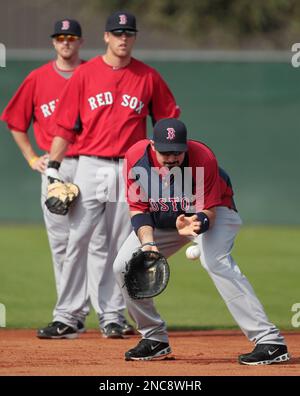 Boston Red Sox infielder Kevin Youkilis is pictured during spring training  baseball in Fort Myers, Fla., Thursday, Feb. 17, 2011. (AP Photo/Dave  Martin Stock Photo - Alamy