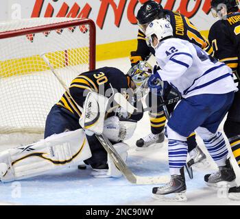 The Buffalo Sabres Tim Connolly (left) upends the New York