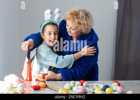 grandmother and granddaughter with uae flag for easter Stock Photo